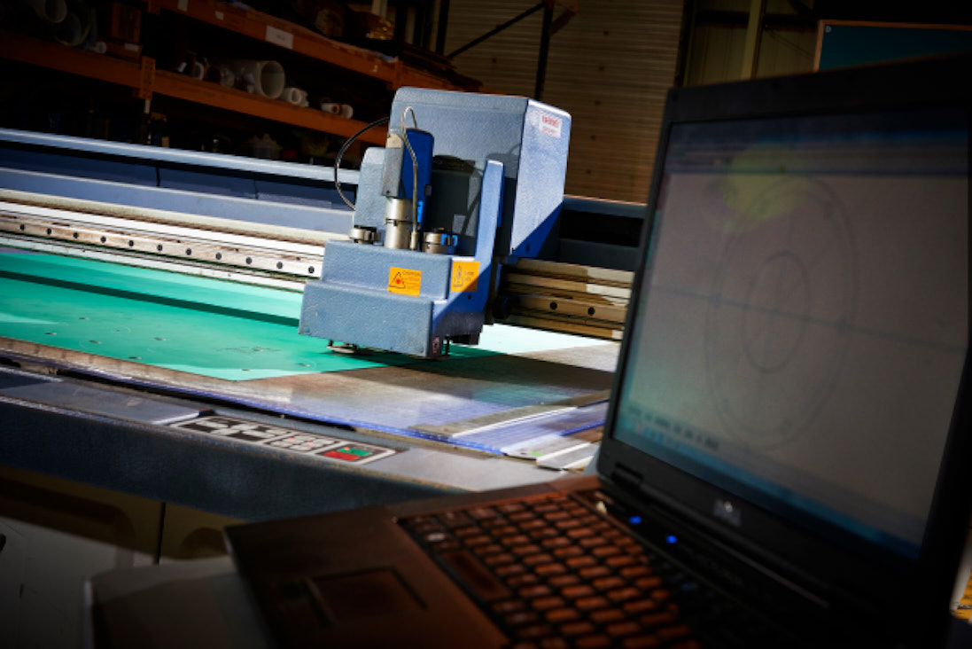 Artios Cutting System A photograph of a Compressed Fibre Gasket being cut on the Artios cutting machine.