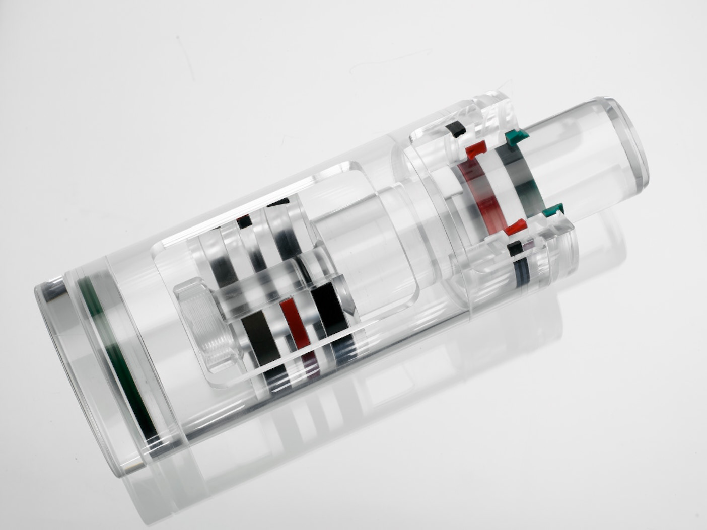 A transparent model of a hydraulic cylinder demonstrating the seals inside